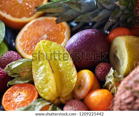 Stock foto: Ripe Juicy Tropical Summer Seasonal Fuits Pineapple Kiwi Citrus Carambola Litci Passion Fruit O