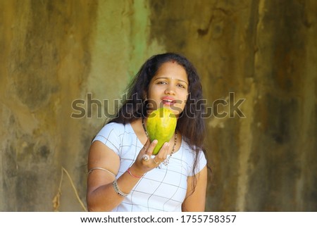 Stock photo: Cheerful Woman With Ripe Papaya