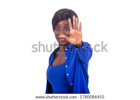 Foto stock: Serious African Businesswoman Making Presentation To Her Colleagues In Office