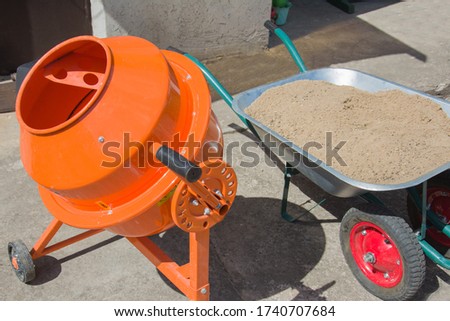 Zdjęcia stock: Construction Workers Pouring And Leveling Wet Cement Into Wood F