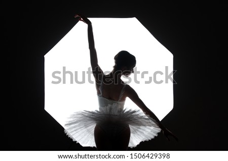 Foto stock: Dark Silhouette Of Woman Against Window Slim Young Female With