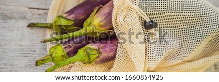 Stock foto: Eggplant In A Reusable Bag On A Stylish Wooden Kitchen Surface Zero Waste Concept