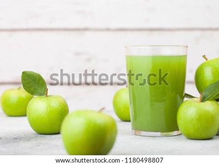 Glass Of Fresh Organic Apple Juice With Granny Smith And British Bramley Apples On Wooden Background Foto stock © DenisMArt