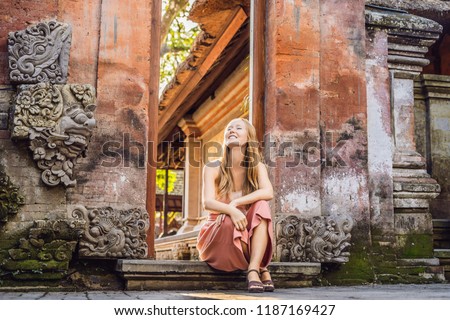 Stock photo: Young Woman Traveler In Ubud Palace Bali - Inside The Ubud Palace Bali Indonesia