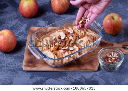 Foto stock: Adding Almond Topping