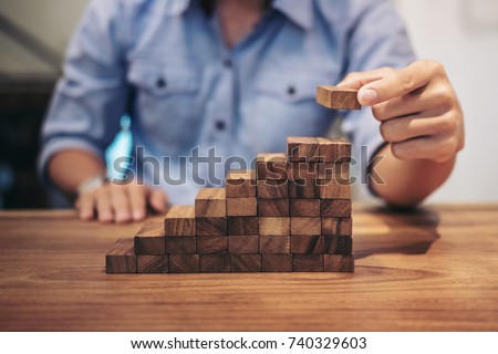 Risk To Make Business Growth Concept With Wooden Blocks Hand Of Stock foto © Freedomz