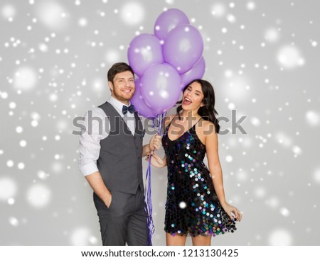 Сток-фото: Happy Couple With Ultra Violet Balloons At Party