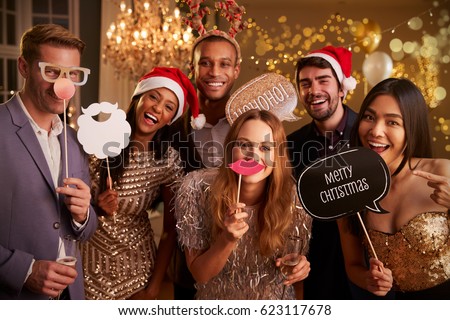 Stock fotó: Happy Couple With Party Props Having Fun