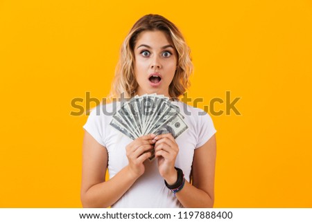 Foto stock: Photo Of Shopper Woman In Basic Clothing Holding Fan Of Dollar M