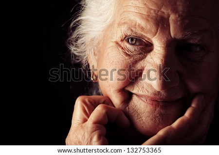 Zdjęcia stock: Close Up Of Happy Senior Woman Looking At Camera On The Beach