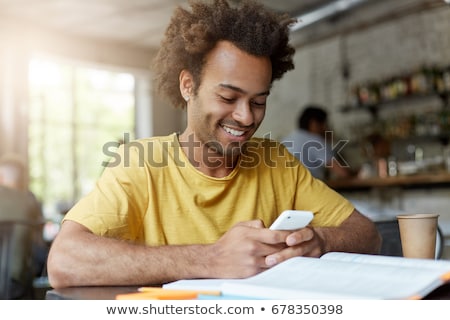 Stock photo: Restful Happy Students Of College Sitting By Table In Cafe After Classes