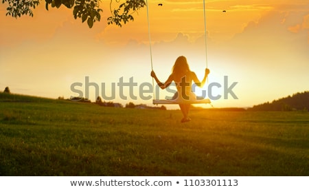 [[stock_photo]]: People Silhouettes On Summer Sunset Meadow