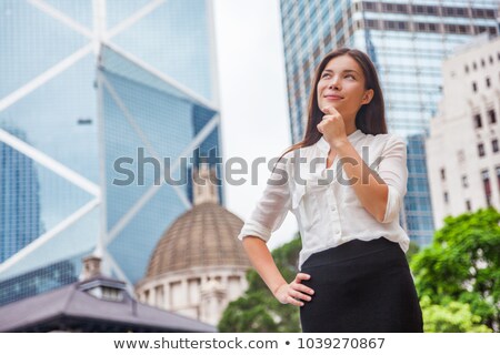 Stock photo: Asian Business Woman Thinking Pensive Of Career Goal Choice Looking Up At Hong Kong City Asia Urban