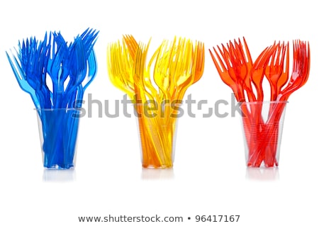 [[stock_photo]]: Disposable Tableware Set Of Three Colored Plastic Forks