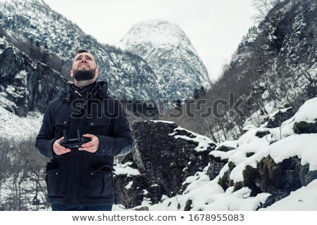 Stock foto: Flying Men At The Waterfall