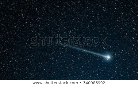 Stok fotoğraf: Falling Star On A Blue Background With A White Trail