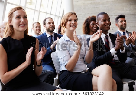 Stock foto: Delegates Listening To Speaker At Conference