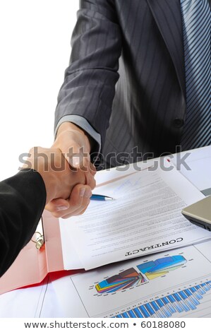 Foto stock: Strechar · las · manos · con · muñecas · y · equipo · de · negocios · 2