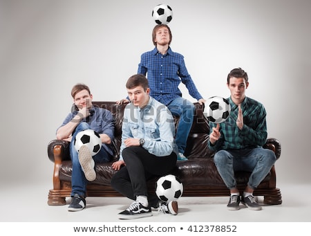 Stock fotó: The Four Guys With Balls On Gray Background