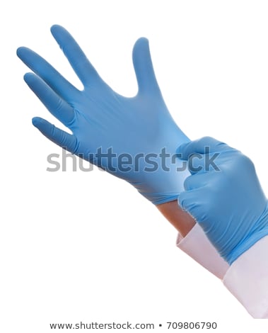 ストックフォト: Closeup Shot Of Hands Of A Medic In The Blue Latex Gloves Isolated On White Background