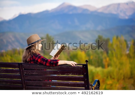 Stockfoto: Woman In Vintage Clothes Reading Book