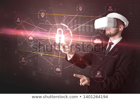 ストックフォト: Man With Vr Goggles Unlocking 3d Network Concept