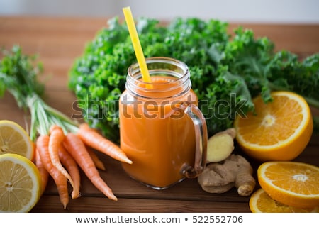 Сток-фото: Glass Jug Of Carrot Juice Fruits And Vegetables