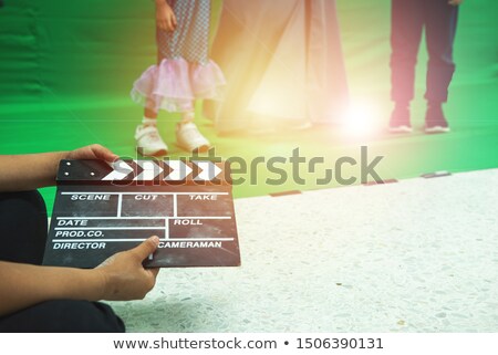 Foto stock: Cameraman Showing The Footage To The Actor