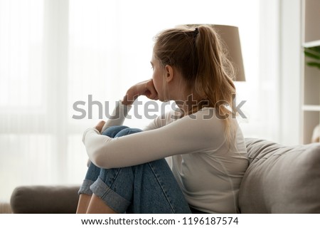 Stock photo: Depressedanxious Young Woman Suffering From Solitude
