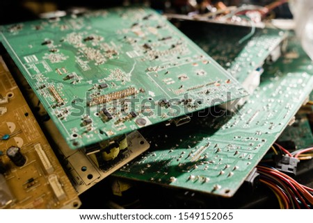 Stock foto: Parts Of Demounted Gadgets Examined By Master Of Repair Service