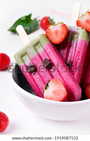 ストックフォト: Frozen Berry Smoothies Multicolored Ice Cream On A Stick With S