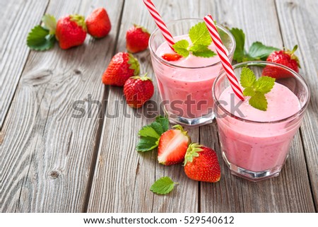 Stock fotó: Two Glasses Of Strawberry Shake