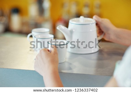 Zdjęcia stock: Crop Server With Teapot And Cups