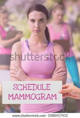 Foto d'archivio: Schedule Mammogram Text And Hand Holding Card With Pink Breast Cancer Awareness Women