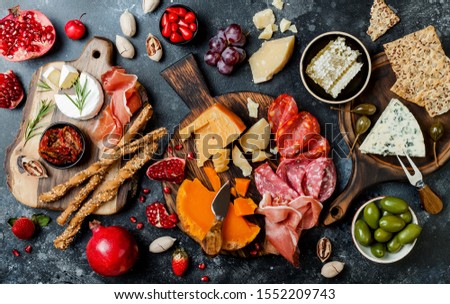 Stock photo: Cheese Meat Grapes And Olives Antipasto