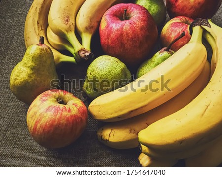 Foto stock: Organic Apples Pears And Bananas On Rustic Linen Background
