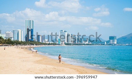 Stockfoto: Man Tourist On The Background Of Nha Trang City Travel To Vietnam Concept