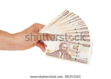 Stock photo: Hand Holding Kenyan Currency