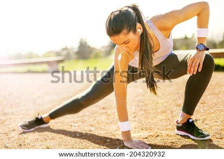 Сток-фото: Beautiful Young Athletic Woman Stretching In Summer