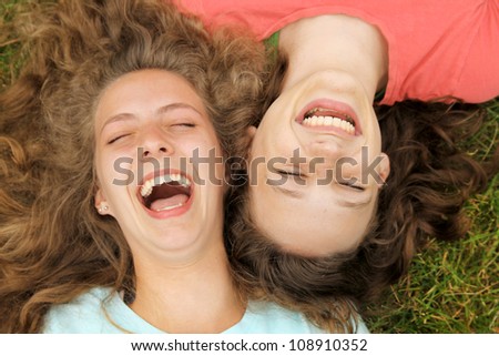 Сток-фото: Happy Teenage Friends Laughing Outdoors In Summer