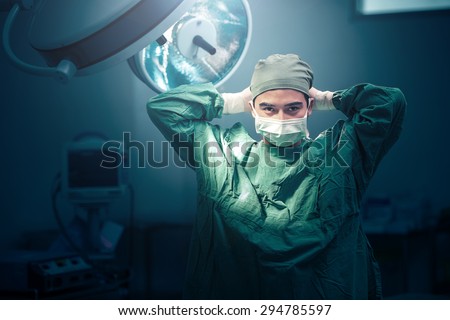 Stok fotoğraf: Asian Surgeons Looking At Camera