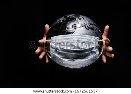 Stock photo: Hands Of Kid Holding Globe Covid 19 Pandemic Infection Disease C