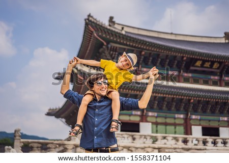 Foto stock: Dad And Son Tourists In Seoul South Korea Travel To Korea Concept Traveling With Children Concept