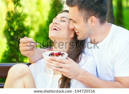 Zdjęcia stock: Couple Eating Breakfast Outdoors