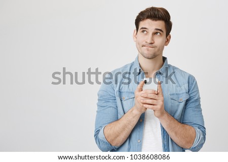Сток-фото: Young Attractive Man Isolated Thinking Emotional On White Close