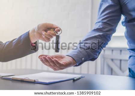 ストックフォト: Man Entering Into A Contract With A Car Service