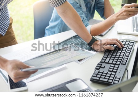 Stockfoto: Asian Team Outsource Developer Looking Screen Programming Code