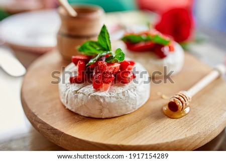 Stock photo: Grilled Camembert Cheese With Strawberry Honey And Basil Leaves Delicatessen