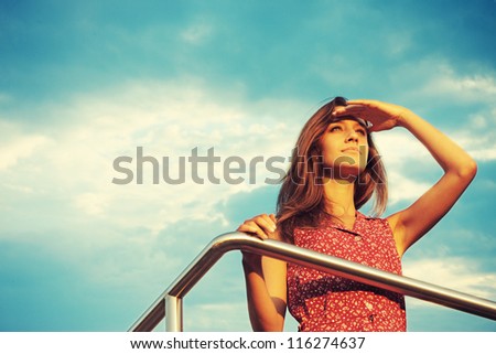 [[stock_photo]]: Young And Beautiful Woman In Sunset Light Looking Far Away Phot