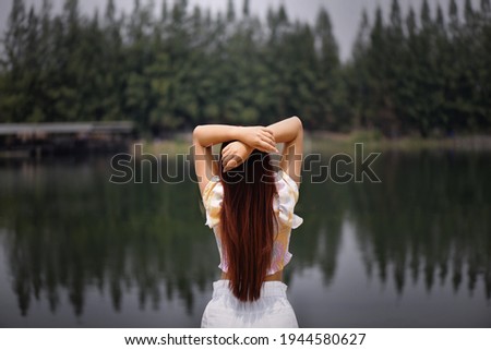 [[stock_photo]]: Woman Enjoying Her Getaway And Freedom In The Forest